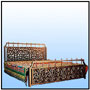 A strikingly rich oriental composition with Moroccan repeat element. Motif spread moulded in medium light alloy; Hand crafted to a diamond front configuration. A matching low footboard and a lot of brushed brass work. A bed or a complete customized bedroom set can be delivered, subject to the availability of sufficient lead time. Timber trim and a variety of motifs are available on order  Sizes: W : 6' H : 4.5'  WT : 160 lbs (Bed Head) 